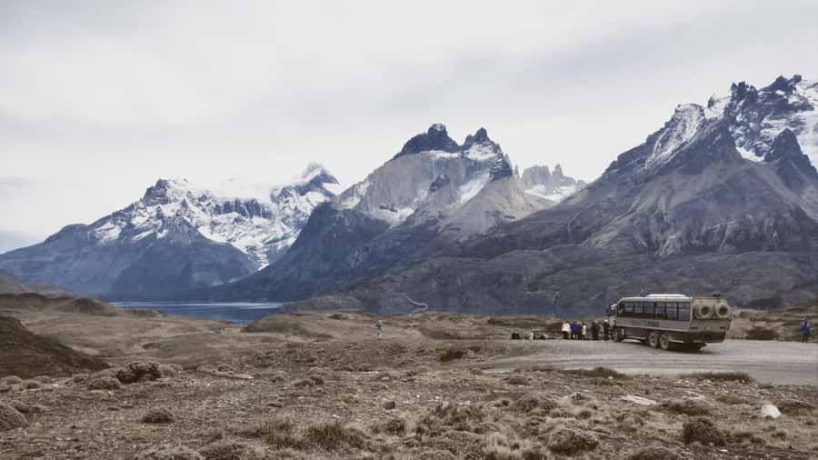 From El Calafate: Torres del Paine Full Day Tour - Guides, vehicles, and the long ride home