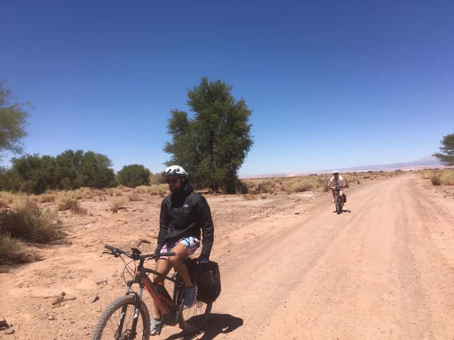 From San Pedro de Atacama: Laguna Cejar E-biking Adventure - Arriving at turquoise Laguna Cejar