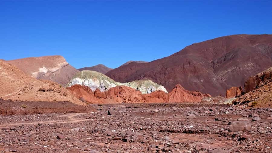 From San Pedro de Atacama: Rainbow Valley Tour - The 7:00 AM pickup from San Pedro