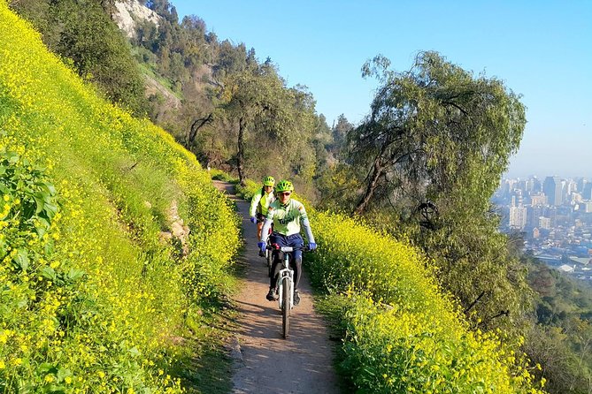 Private San Cristobal Hill Mountain Bike Tour - Taking the cable car toward San Cristobal Hill