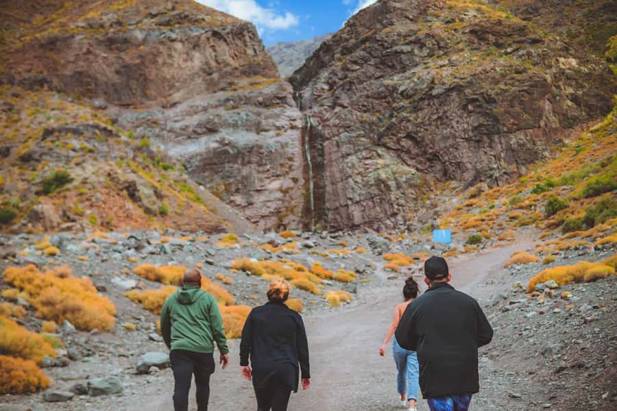 Santiago: Cajón del Maipo Hot Springs & Chilean Barbecue - A Chilean barbecue with wine and firelight