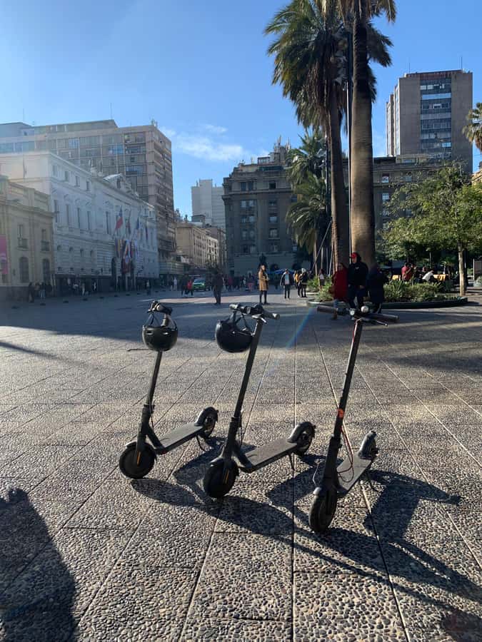 Santiago: Electric Scooter City Tour with Lunch - Riding Along the Alameda to La Moneda