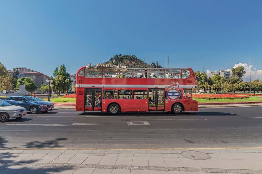 Santiago: Hop-on Hop-off Bus Day Ticket with Audio Guide - Plaza de la Aviación beside the Mapocho River